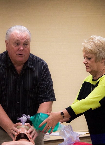 Kathy and Paul leading a CPR class