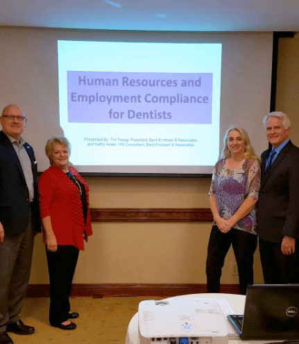 Kathy and Paul and two other presenters at training session