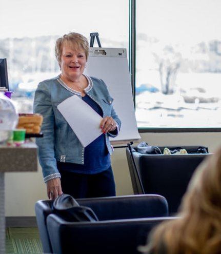 Kathy presenting at dental consultation event